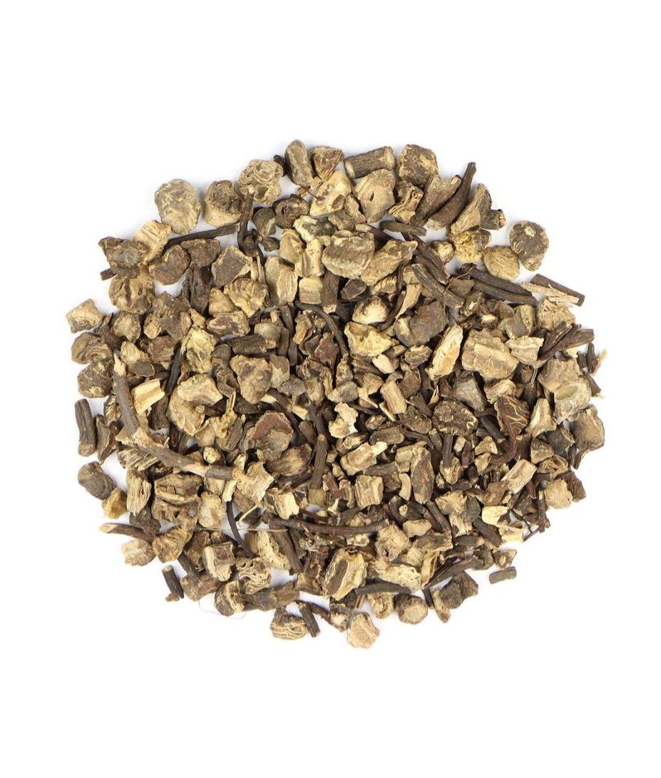 Dried black cohosh root pieces on a white background, traditionally used for supporting women’s hormonal and menopausal wellness.