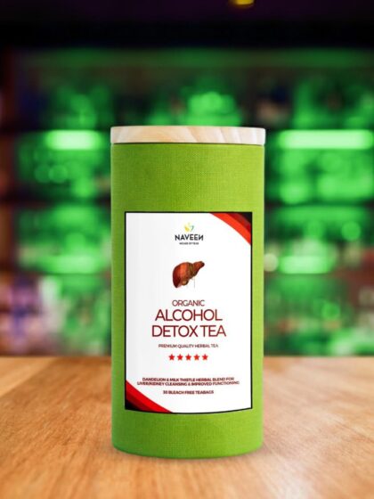 Organic alcohol detox tea container on wooden table with herbal liver detox ingredients.