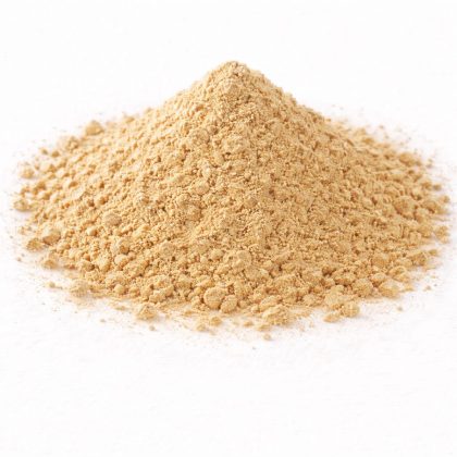 Pile of black Tongkat ali root powder on white textured background