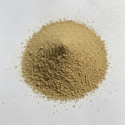 Pile of yohimbe powder from Naveen Herbs on a white background