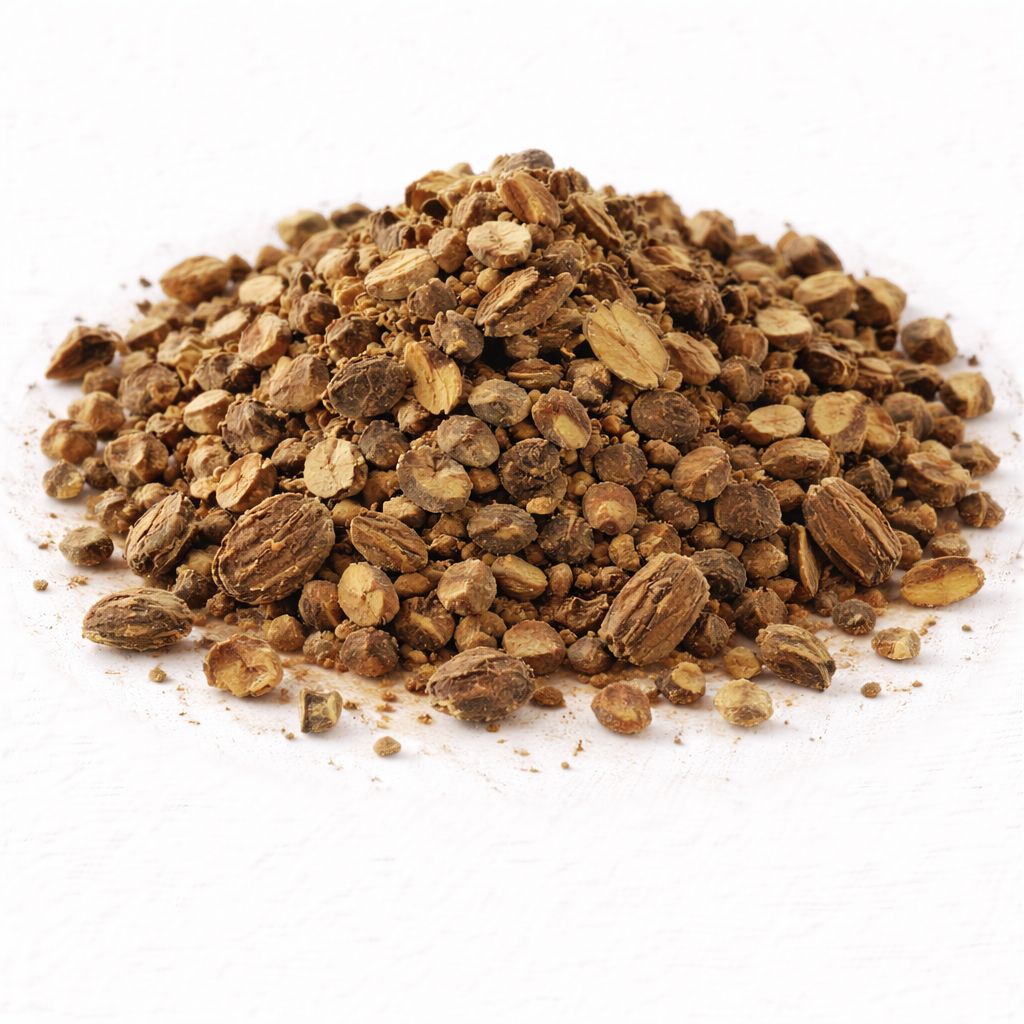 Pile of dried black cohosh root pieces on white textured background