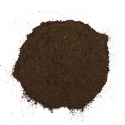 Black walnut hull powder in a fine herbal form on a plain background