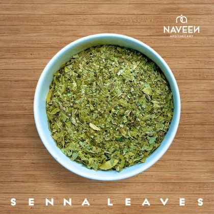 A bowl of dried senna leaves on a wooden surface with the Naveen Apothecary logo.
