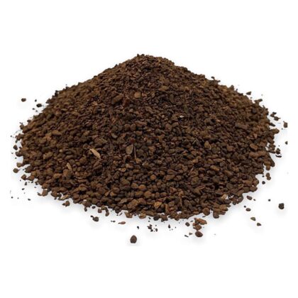 Pile of roasted chicory root from Naveen Herbs on a white background