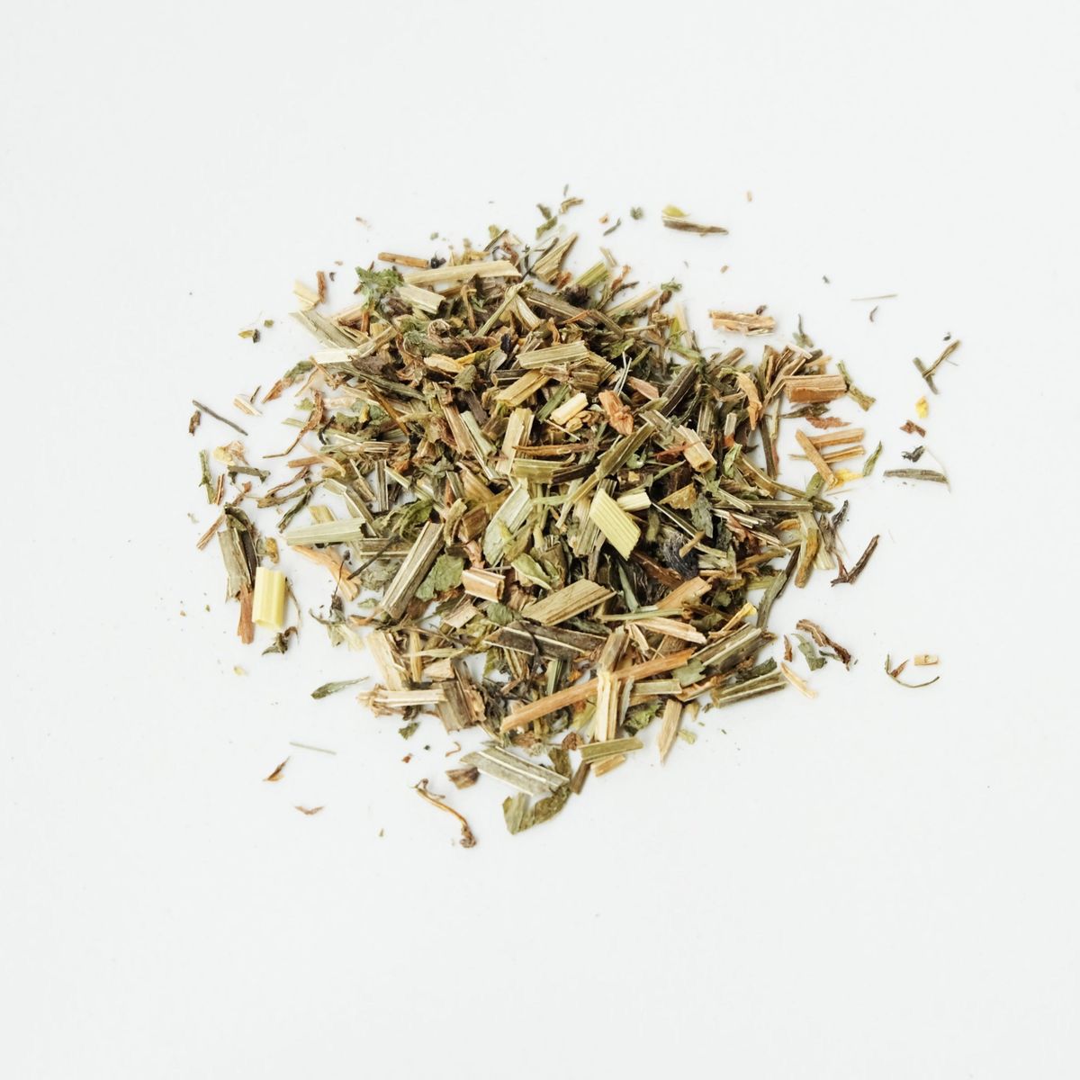 Pile of dried cleavers herb from Naveen Herbs on a white background