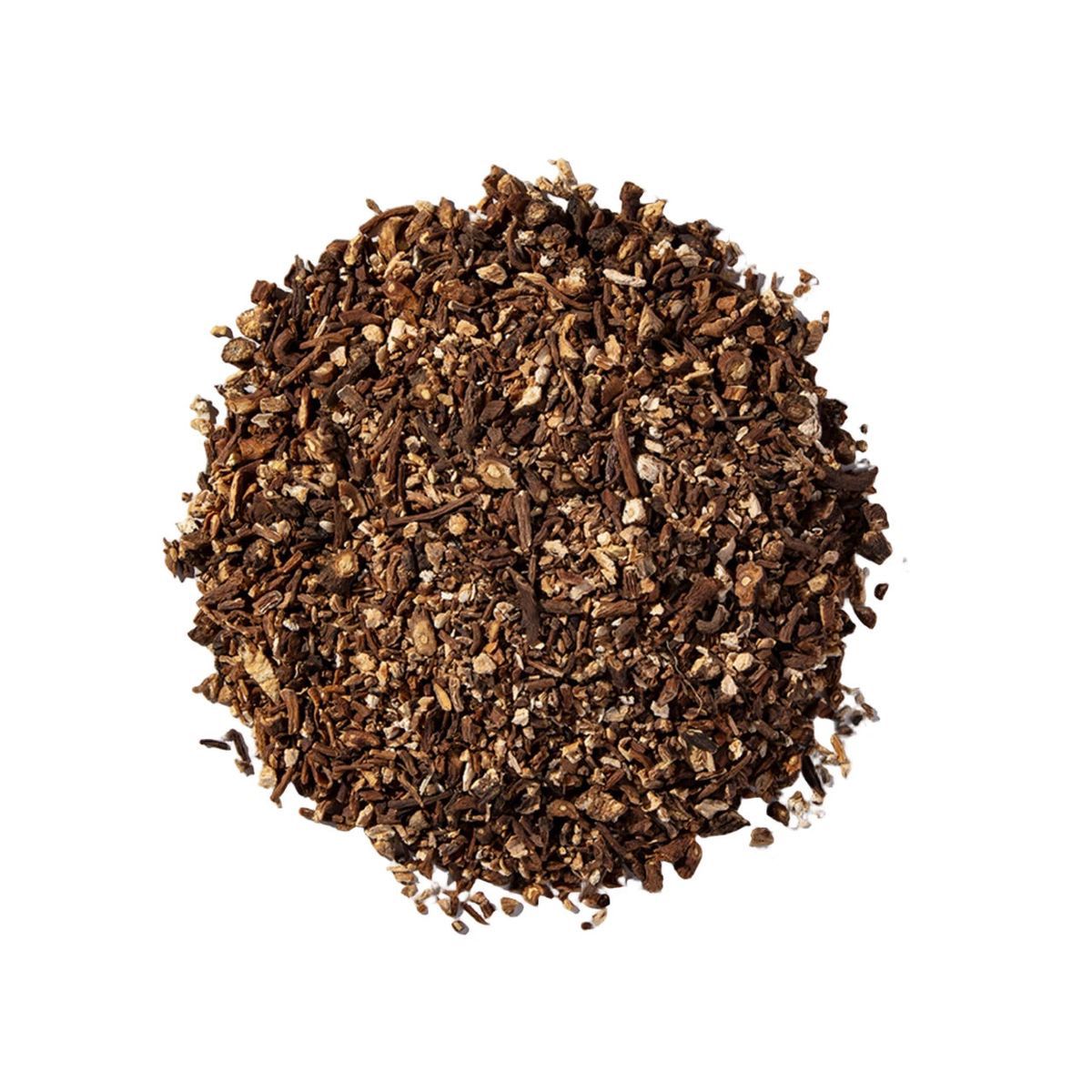 Pile of dried dandelion root from Naveen Herbs on a white background