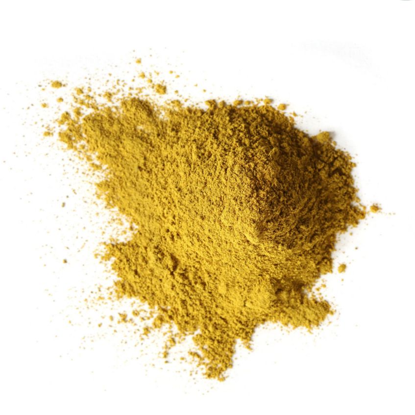 Pile of goldenseal root powder on a white background