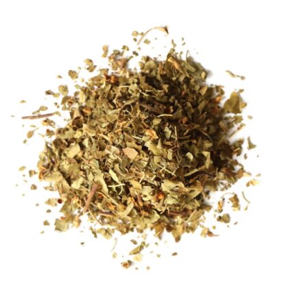 Pile of dried hawthorn leaf and flower on a white background