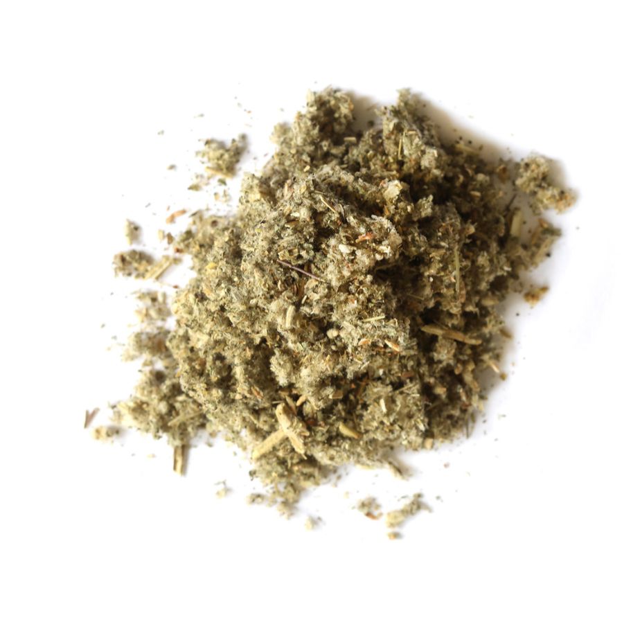 Pile of dried horehound herb on a white background