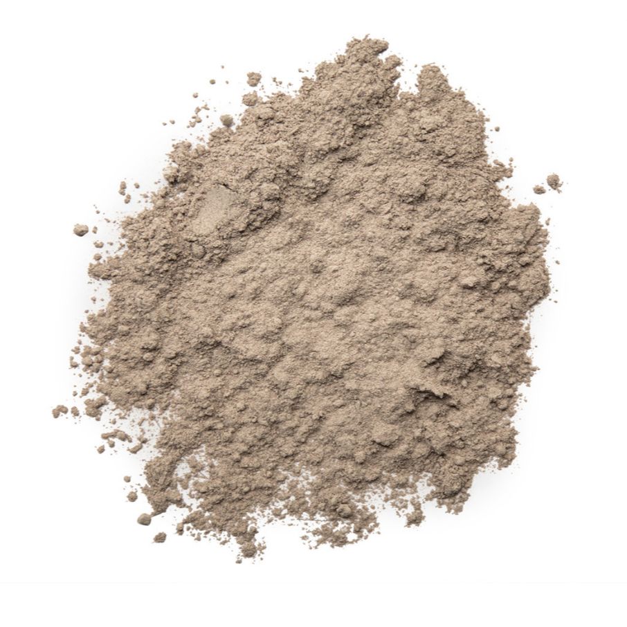 Pile of Irish seamoss powder on a white background