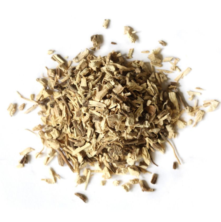 Pile of dried kava kava root on a white background