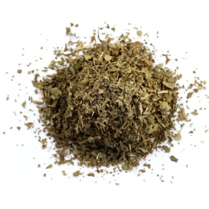 Pile of dried lady’s mantle herb on a white background