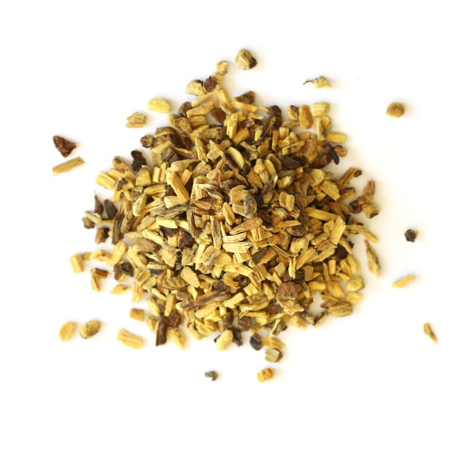 Pile of dried licorice root on a white background