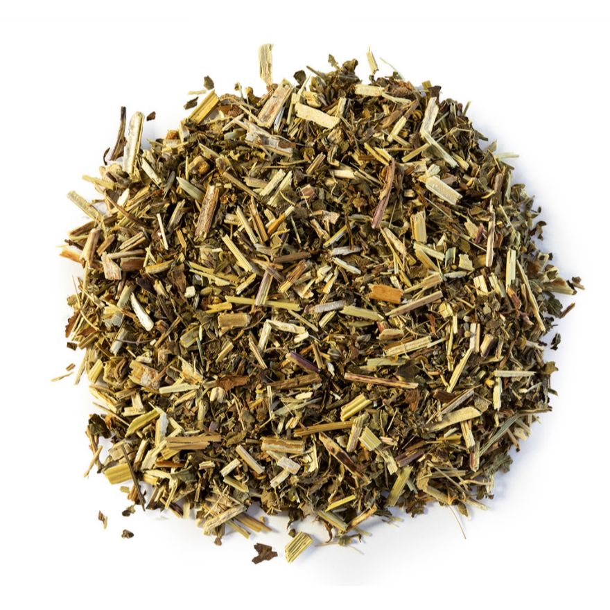 Pile of dried meadowsweet herb on a white background