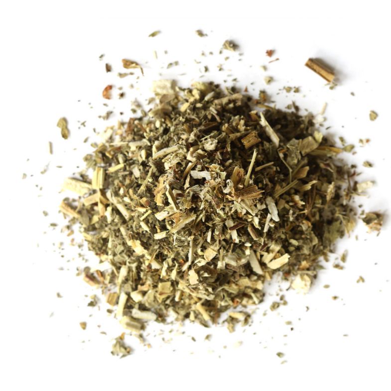 Pile of dried motherwort herb on a white background