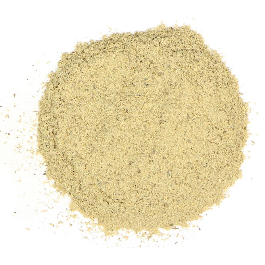 Pile of muira puama powder on a white background