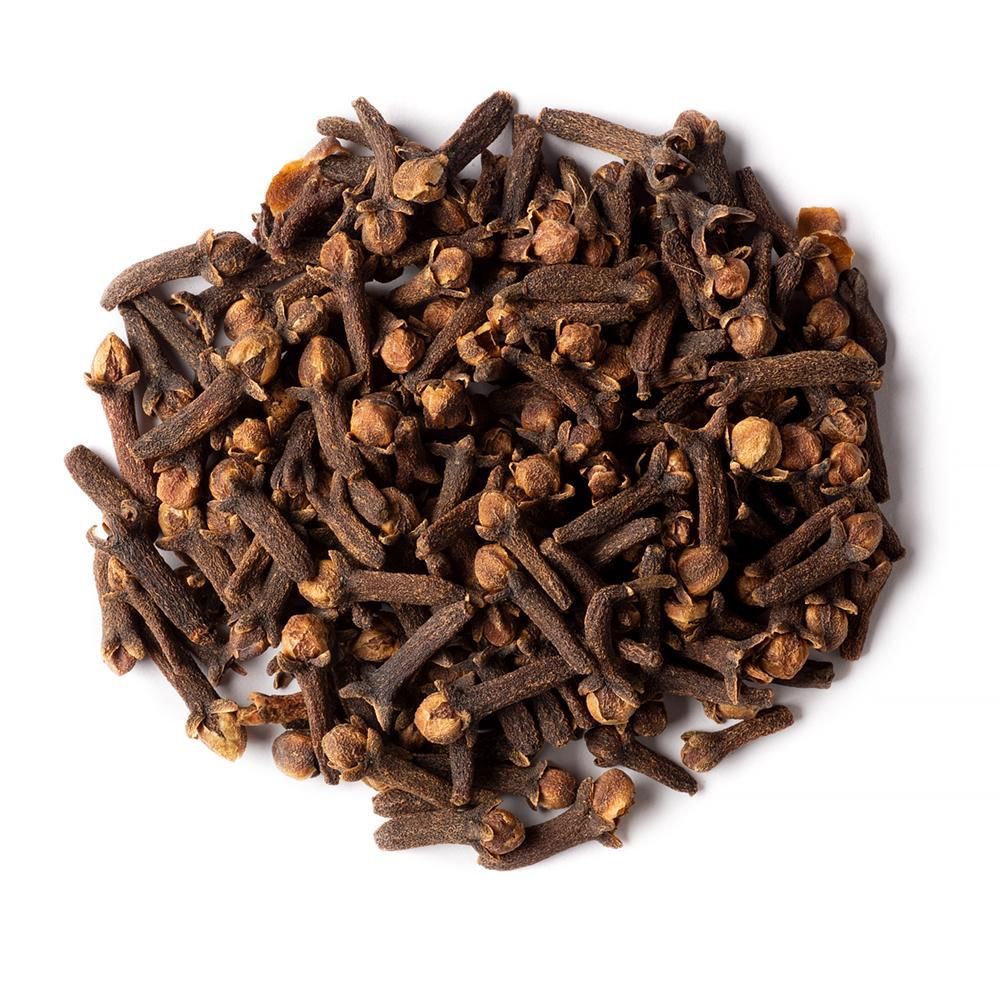 Pile of whole cloves from Naveen Herbs on a white background